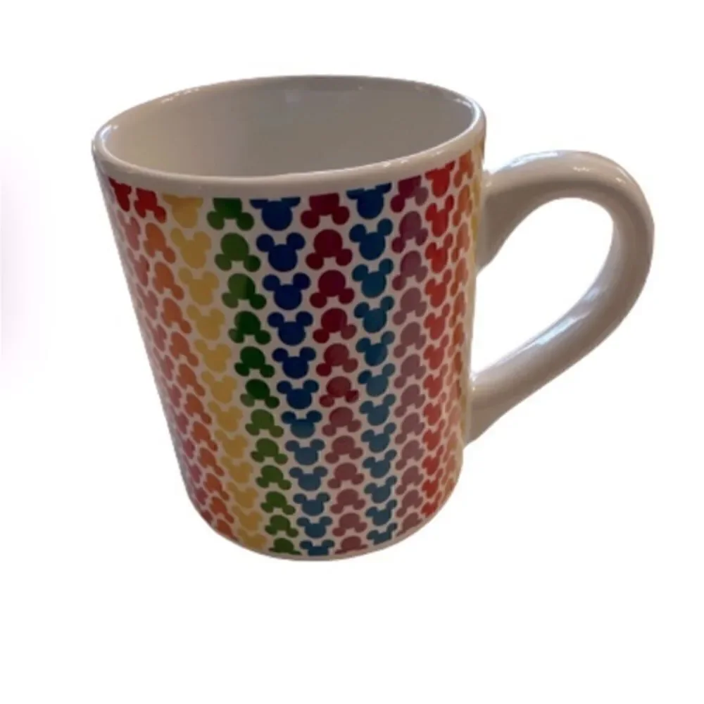 Disney Mickey Mouse Rainbow mug 14 oz. Small silhouettes of Mickey Mouse’s Head